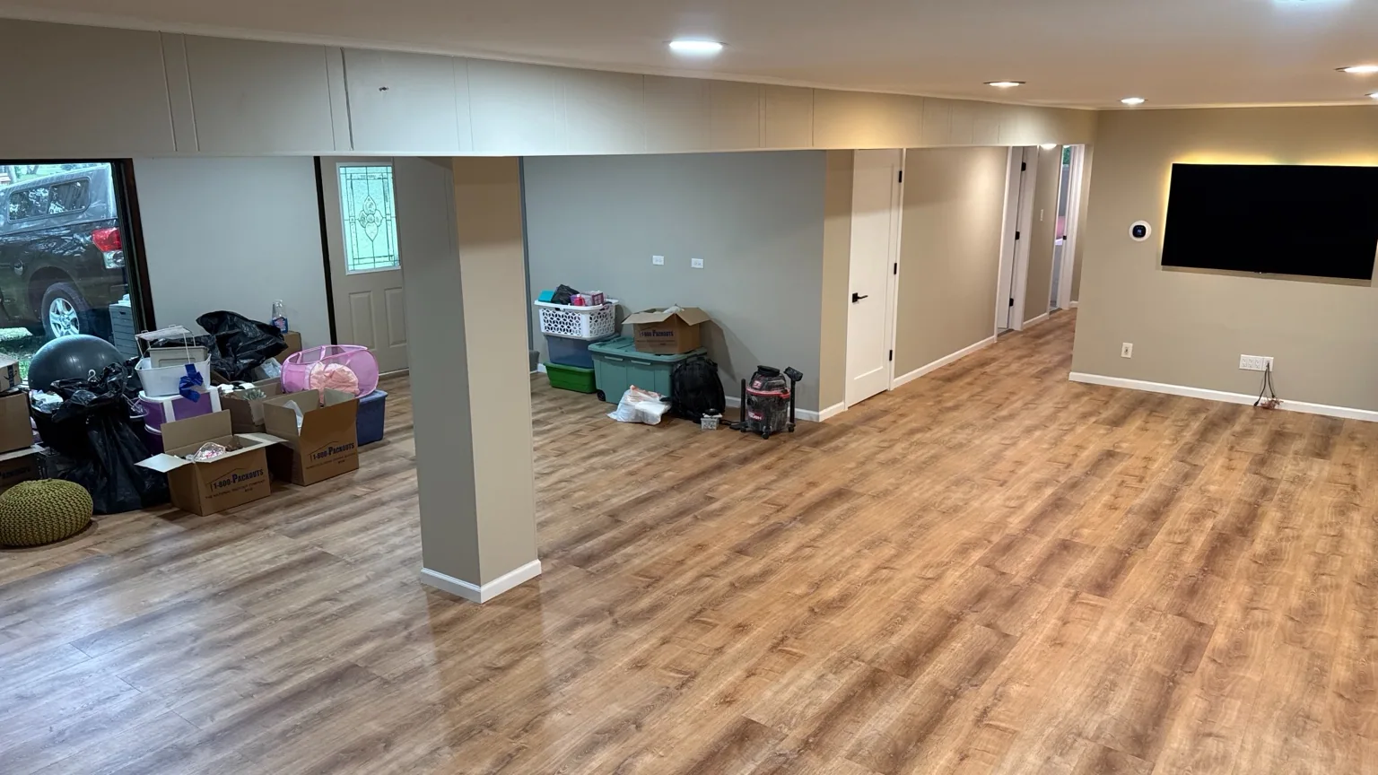 Completed basement remodeling with luxury vinyl flooring